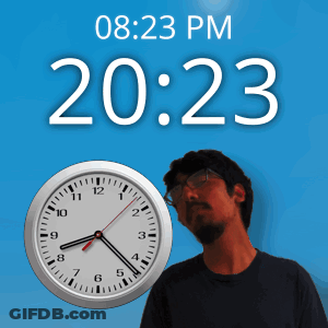 A Man Is Standing In Front Of A Clock That Says 20:23 Pm GIF