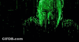 A Man Is Standing In Front Of A Computer Screen With Green Numbers On It . GIF