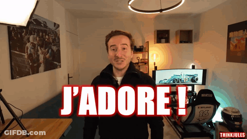 Man Standing In Front Of Computer With J'adore Written GIF