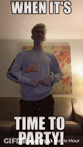 A Man Is Standing In Front Of A Couch With The Words " When It 'S Time To Party " GIF
