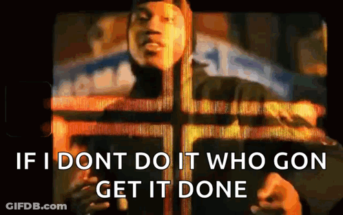 A Man Is Standing In Front Of A Cross With The Words `` If I Don T Do It Who Gon Get It Done '' . GIF