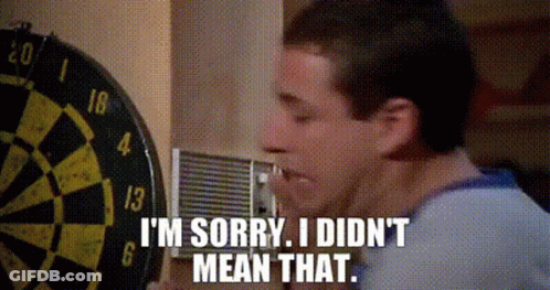 A Man Is Standing In Front Of A Dart Board And Says I 'M Sorry I Did N't Mean That GIF