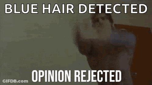 A Man Is Standing In Front Of A Door With The Words `` Blue Hair Detected Opinion Rejected '' Written Above Him . GIF