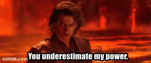 A Man Is Standing In Front Of A Fire And Says You Underestimate My Power . GIF