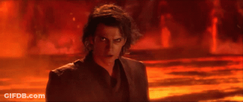 A Man Is Standing In Front Of A Fire And Says " You Underestimate My Power " GIF