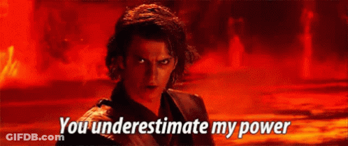 A Man Is Standing In Front Of A Fire With The Words `` You Underestimate My Power '' Written On It . GIF