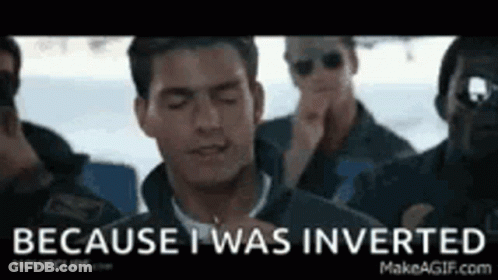 A Man Is Standing In Front Of A Group Of Men And Says `` Because I Was Inverted '' GIF