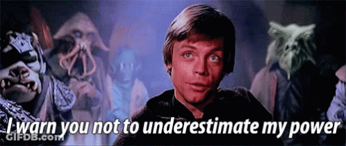 A Man Is Standing In Front Of A Group Of Monsters With The Words " I Warn You Not To Underestimate My Power " Above Him GIF
