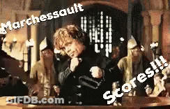 A Man Is Standing In Front Of A Group Of People With The Words Marchessault Scores Written On The Bottom Of The Image GIF