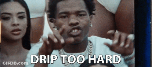 A Man Is Standing In Front Of A Group Of Women With The Words Drip Too Hard Written Above Him . GIF