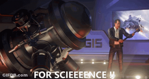 A Man Is Standing In Front Of A Large Machine That Says Gis On It GIF