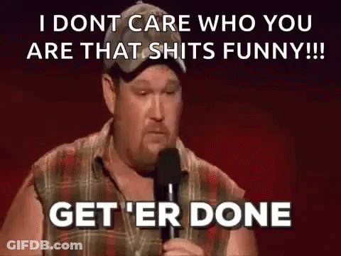 A Man Is Standing In Front Of A Microphone And Saying `` I Dont Care Who You Are That Shits Funny '' . GIF