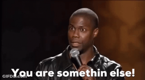 A Man Is Standing In Front Of A Microphone And Saying `` You Are Somethin Else ! '' GIF