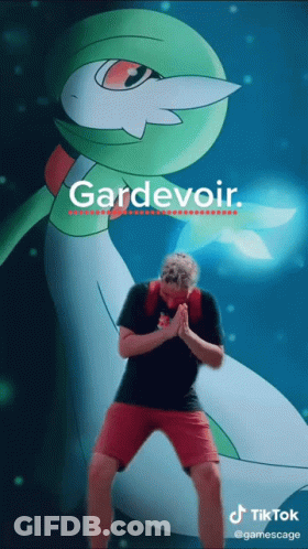 A Man Is Standing In Front Of A Pokemon Named Gardevoir GIF