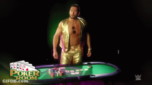 A Man Is Standing In Front Of A Poker Table With The Words Duke 'S Poker Room On The Bottom GIF
