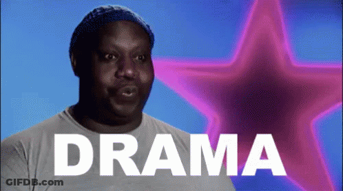 A Man Is Standing In Front Of A Purple Star And The Word Drama Is On The Screen GIF