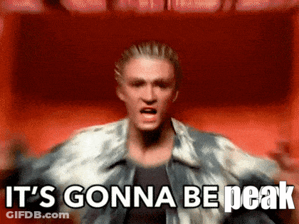 A Man Is Standing In Front Of A Red Background And Says It 'S Gonna Be Peak GIF