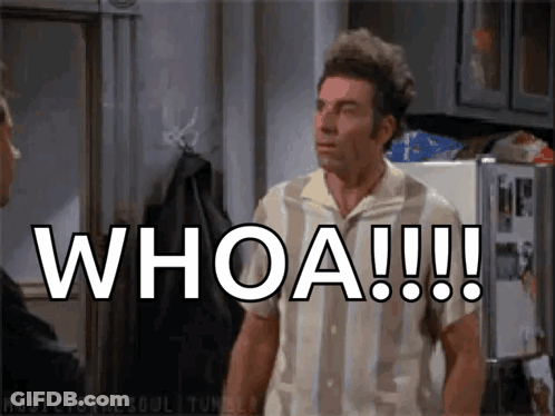 A Man Is Standing In Front Of A Refrigerator With The Words Whoa Written On It GIF