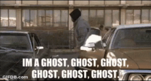A Man Is Standing In Front Of A Row Of Cars And Says Im A Ghost Ghost Ghost Ghost GIF