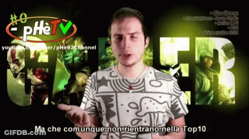 A Man Is Standing In Front Of A Screen That Says Phe Tv GIF