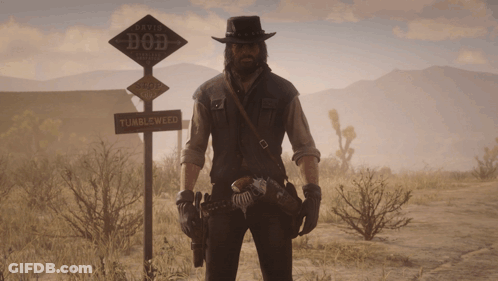 A Man Is Standing In Front Of A Sign That Says Bob GIF