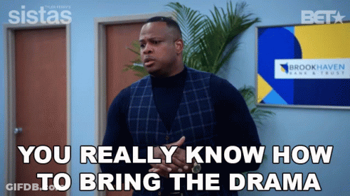 A Man Is Standing In Front Of A Sign That Says Brookhaven GIF