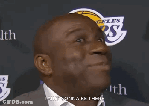 A Man Is Standing In Front Of A Sign That Says I Ain T Gonna Be There GIF