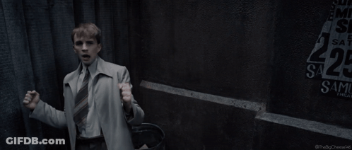 A Man Is Standing In Front Of A Sign That Says I Can Do This All Day GIF