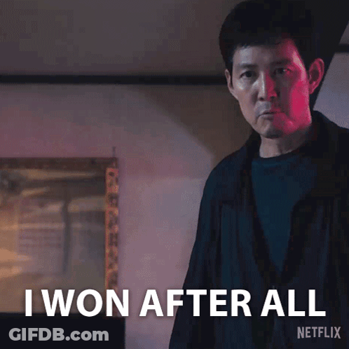 A Man Is Standing In Front Of A Sign That Says I Won After All Netflix GIF