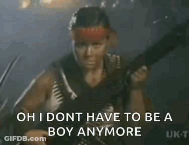 A Man Is Standing In Front Of A Sign That Says `` Oh I Don T Have To Be A Boy Anymore '' GIF