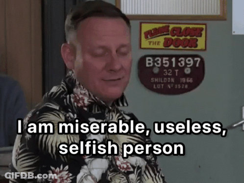 A Man Is Standing In Front Of A Sign That Says " Please Close The Door " GIF