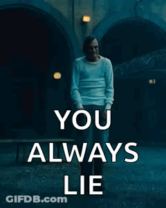 A Man Is Standing In Front Of A Sign That Says `` You Always Lie '' GIF