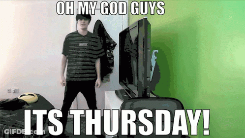 A Man Is Standing In Front Of A Tv With The Words Oh My God Guys It 'S Thursday GIF