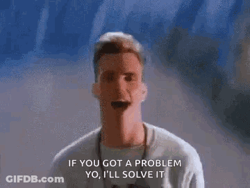 A Man Is Standing In Front Of A Wall And Talking About A Problem . GIF