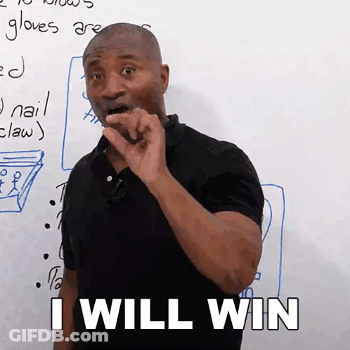 A Man Is Standing In Front Of A White Board And Says I Will Win GIF