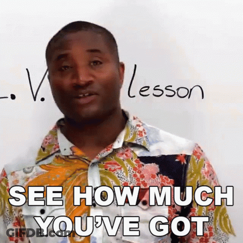 A Man Is Standing In Front Of A White Board With The Word Lesson Written On It GIF