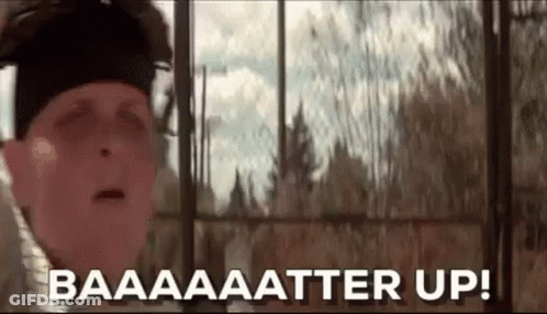 A Man Is Standing In Front Of A Window With His Eyes Closed And The Words `` Baaaaa Atter Up '' . GIF