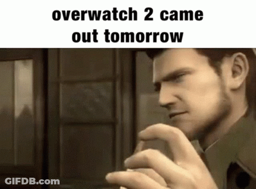 A Man Is Standing In Front Of A Window With His Hand On His Chin And A Meme That Says Overwatch 2 Came Out Tomorrow . GIF