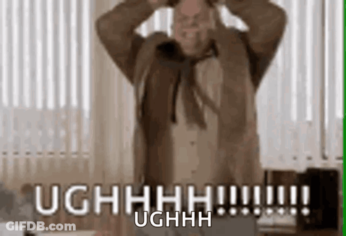 A Man Is Standing In Front Of A Window With His Hands On His Head And Says Ughhhh . GIF