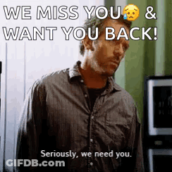 A Man Is Standing In Front Of A Window With The Words `` We Miss You And Want You Back '' Written On It . GIF