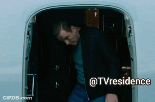 A Man Is Standing In The Doorway Of An Airplane With The Words @Tvresidence Written Below Him GIF
