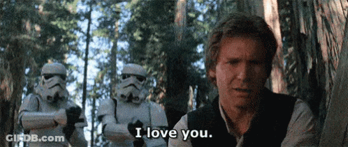 A Man Is Standing In The Woods With Stormtroopers Behind Him And Says I Love You . GIF