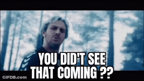 A Man Is Standing In The Woods With The Words `` You Did N't See That Coming ? '' GIF