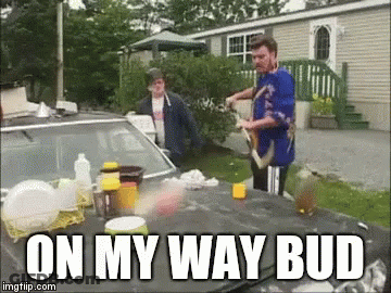 A Man Is Standing Next To A Car With The Words On My Way Bud Written On The Bottom GIF