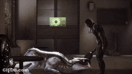 A Man Is Standing Next To A Dead Animal In A Room . GIF