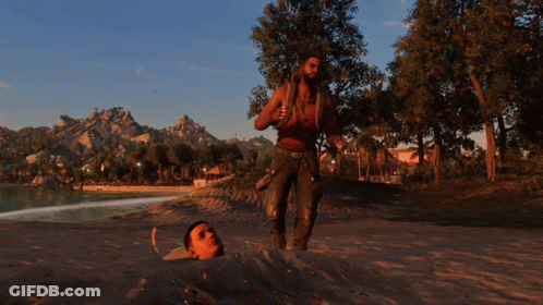 A Man Is Standing Next To A Man Buried In The Sand GIF