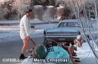 A Man Is Standing Next To A Pile Of Trash And A Car . GIF