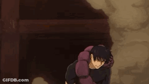 A Man Is Standing Next To A Purple Worm . GIF