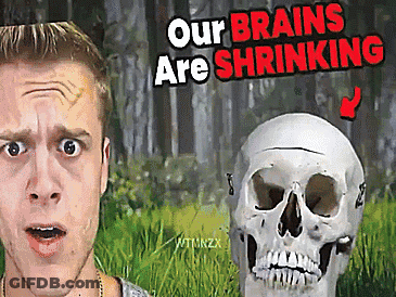 A Man Is Standing Next To A Skull With The Words Our Brains Are Shrinking Above Him GIF