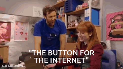 A Man Is Standing Next To A Woman Who Is Using A Laptop And Says " The Button For The Internet " GIF